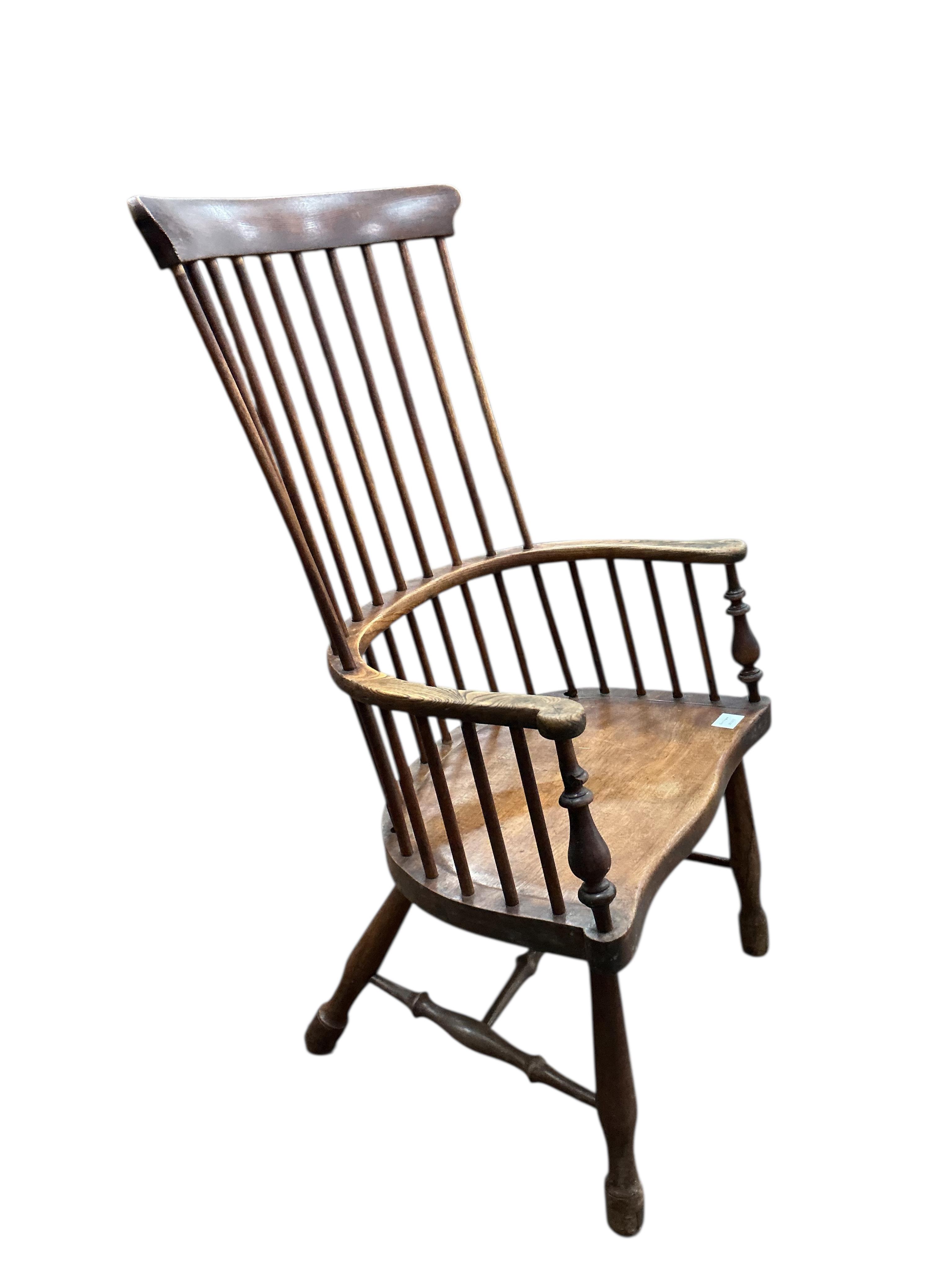 A late 19th century Windsor comb back armchair, width 59cm, depth 40cm, height 113cm